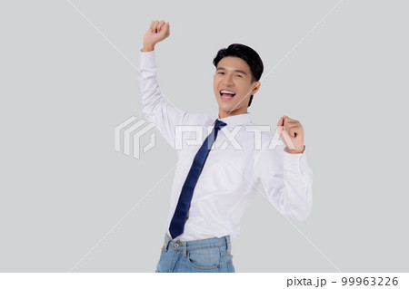 Portrait beautiful businessman in suit standing with glad and success isolated. Portrait beautiful businessman in suit standing with glad and success isolated. 99963226