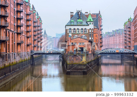 The old warehouse district Speicherstadt in Hamburg, Germany in winter. The old warehouse district Speicherstadt in Hamburg, Germany in winter. 99963332