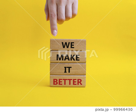 We make it better symbol. Wooden blocks with words We make it better. Beautiful yellow background. Businessman hand. Business and We make it better concept. Copy space. We make it better symbol. Wooden blocks with words We make it better. Beautiful yellow background. Businessman hand. Business and We make it better concept. Copy space. 99966430