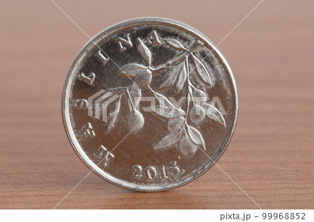 Croatian coin 20 lipa on wooden table. Croatian coin 20 lipa on wooden table. 99968852