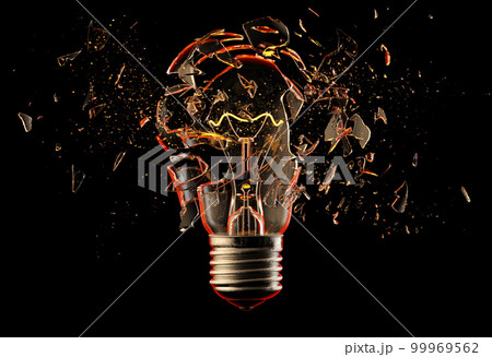 Exploding light bulb on a blue background,  99969562