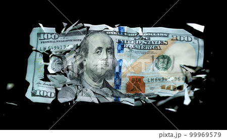 Broken US paper money on a black background 99969579