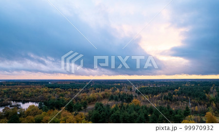 Beautiful colored forest during fall. Aerial drone picture of Belgian forest in Antwerp in autumn Beautiful colored forest during fall. Aerial drone picture of Belgian forest in Antwerp in autumn 99970932