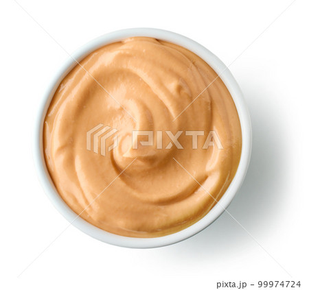 bowl of tomato sauce with mayonnaise 99974724
