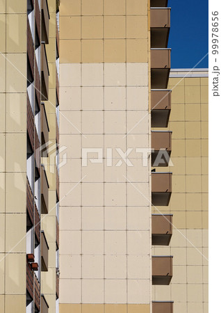 high-rise with dark brown balconies  99978656