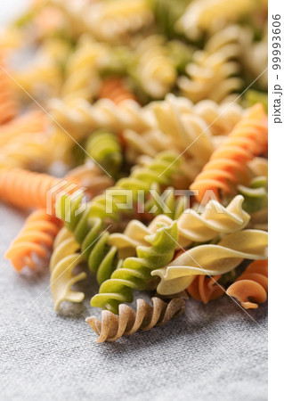 A variety of fusilli pasta made from different types of legumes, green and red lentils, mung beans and chickpeas. Gluten-free pasta. 99993606