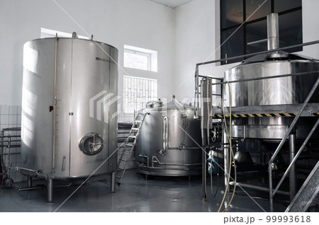 interior of modern factory brewery with tanks inside 99993618