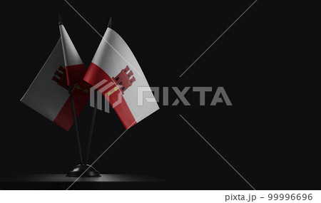 Small national flags of the Gibraltar on a black background Small national flags of the Gibraltar on a black background 99996696