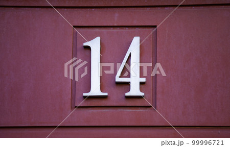 Number fourteen on a wall 99996721