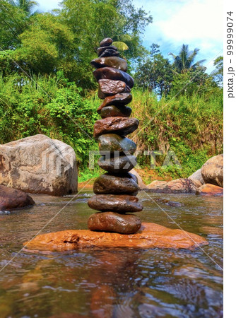 Pile of stones that i arranged in the river 99999074