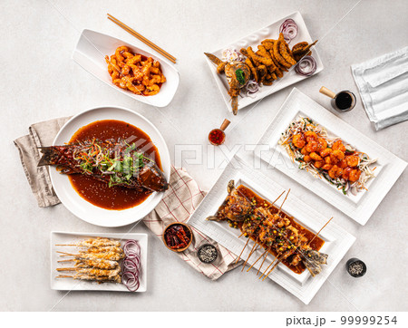 Assorted variety of asian chinese food table 99999254