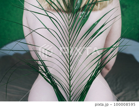 Back health. Flowers lie on the spine, symbolizing cartilage and vertebrae. Correct posture or stoop. Spine and back health concept Back health. Flowers lie on the spine, symbolizing cartilage and vertebrae. Correct posture or stoop. Spine and back health concept 100008595