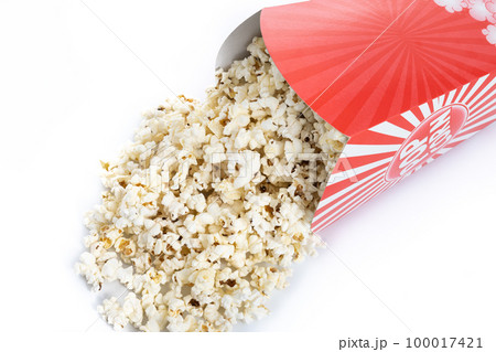 Popcorn in red and white striped cardboard bucket isolated on white background Popcorn in red and white striped cardboard bucket isolated on white background 100017421