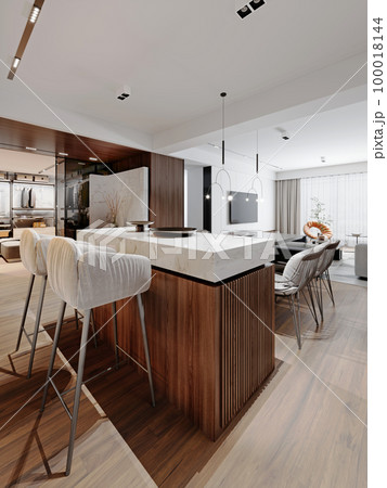 Designer kitchen studio and living room with kitchen island with attached dining table with designer chairs in light colors and slat furniture. 100018144