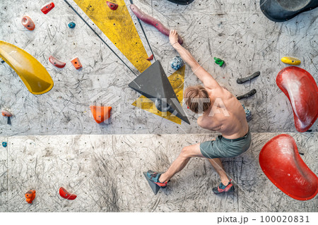 bouldering on an artificial climbing wall bouldering on an artificial climbing wall 100020831