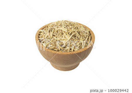 siberian ginseng in latin Eleutherococcus senticosus in wooden bowl isolated on white background. 100029442