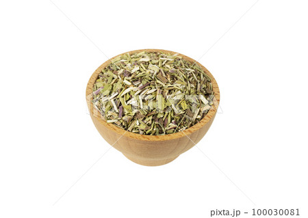 Catnip herb in latin - Nepeta cataria in wooden bowl isolated on white background. in wooden bowl isolated on white background. Medicinal herb. 100030081
