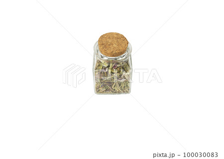 Catnip herb in latin - Nepeta cataria in a glass jar isolated on white background. Medicinal herb. 100030083