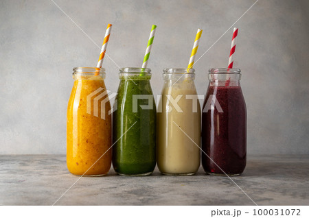 Fresh fruit smoothie bottles, healthy detox drinks. 100031072