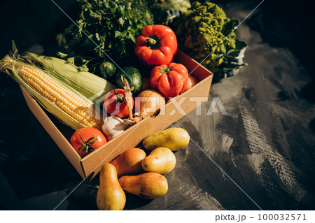 Organic harvest fruits and vegetables from garden. Organic harvest fruits and vegetables from garden. 100032571