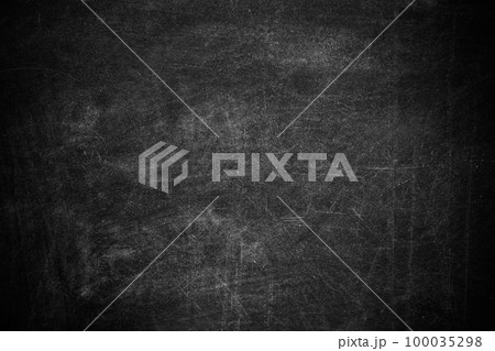 Dirty black chalkboard as background. Space for text 100035298
