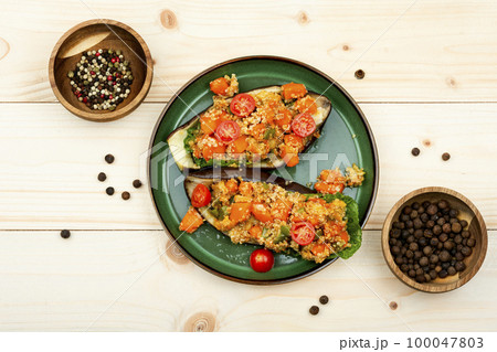 Yummy vegetarian food, stuffed eggplant Yummy vegetarian food, stuffed eggplant 100047803