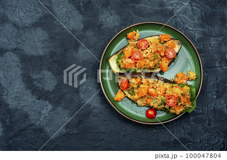 Baked stuffed eggplant, copy space. Baked stuffed eggplant, copy space. 100047804