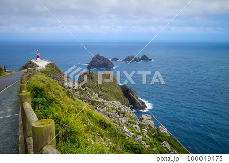 Lighthouse, Cape Ortegal cliffs and atlantic ocean, Galicia, Spain 100049475