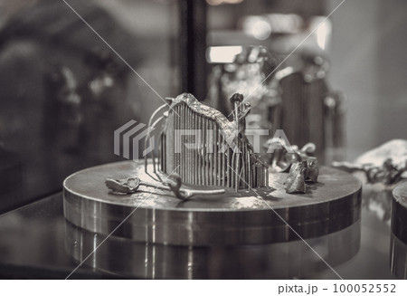 Object printed on metal 3d printer close-up. Object printed in laser sintering machine. Modern 3D printer printed from metal powder. Concept progressive additive DMLS, SLM, SLS 3d printing technology 100052552