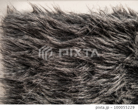Long gray fake fur texture cover Synthetic fiber soft faux fur macro fabric photo Monochrome fluffy furry surface design Long gray fake fur texture cover Synthetic fiber soft faux fur macro fabric photo Monochrome fluffy furry surface design 100055229