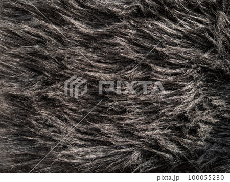 Long gray fake fur texture cover Synthetic fiber soft faux fur macro fabric photo Monochrome fluffy furry surface design Long gray fake fur texture cover Synthetic fiber soft faux fur macro fabric photo Monochrome fluffy furry surface design 100055230