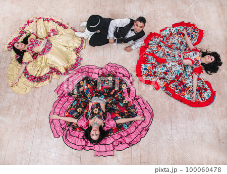 top view. dance group performing Gypsy folk dance 100060478