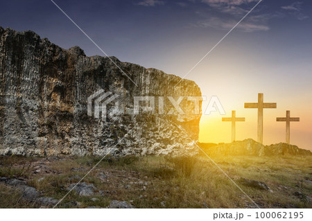 Christian Cross on the rock hill 100062195
