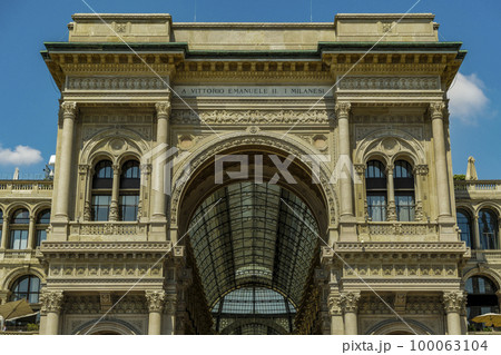 Milan, Italy Galleria Vittorio Emanuele II facade at Piazza del Duomo. Day view of historic mall entrance at Duomo square. 100063104