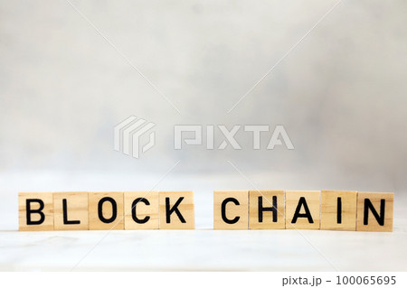 Blockchain text on wooden cubes, cryptocurrency,technology binary code, ditigal data and secure money, ledger bitcoin concept copy space background 100065695