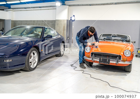 detailing, wash and cleaning of old and new cars in a car studio detailing, wash and cleaning of old and new cars in a car studio 100074937