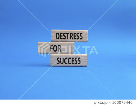 Destress for Success symbol. Concept words Destress for Success on wooden blocks. Beautiful blue background. Business and Destress for Success concept. Copy space. 100075446