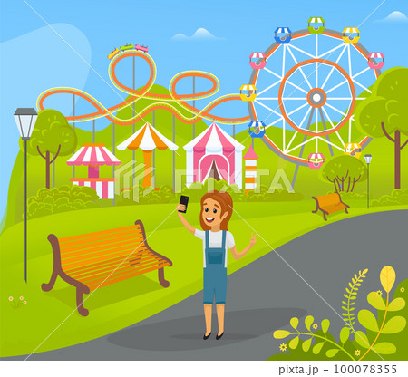 Child with smartphone is taking self photo while walking in amusement park with attractions Child with smartphone is taking self photo while walking in amusement park with attractions 100078355