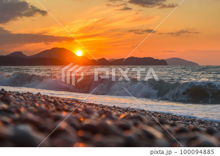 Sea coast with stones at sunrise. Beach of Black sea 100094885