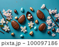 Easter composition with chocolate and gold eggs 100097186