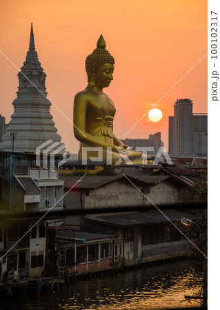 landscape of big buddha in the city large Buddha statue  in Bangkok Wat Pak Nam Phasi Charoe Thailand 100102317