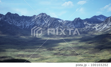 Red-brown slopes and snow-capped mountain peaks 100103202