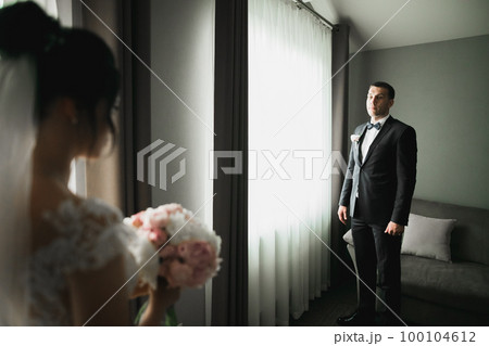 Close up of a nice young wedding couple 100104612