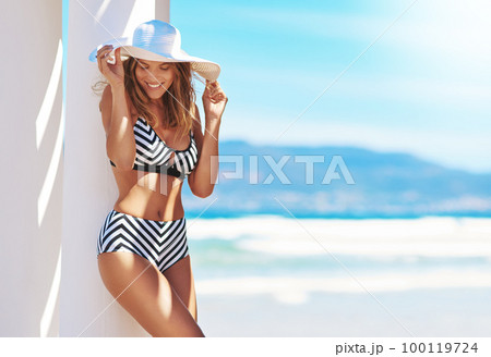 Life is better in a bikini. Shot of an attractive young woman posing in her bikini. 100119724