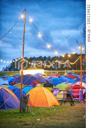 Colorful camp. Shot of a large group of tents at an outdoor festival. Colorful camp. Shot of a large group of tents at an outdoor festival. 100119932