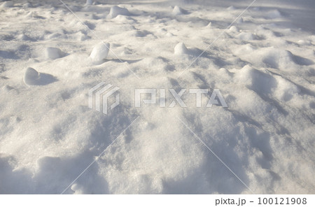 Snow texture, snowdrifts under sunlight with shadows Snow texture, snowdrifts under sunlight with shadows 100121908