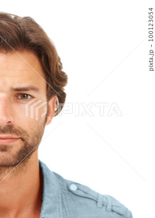 Half face, portrait and man in a studio with mockup space for marketing or advertisement. Natural, young and handsome male model isolated by a white background with mock up for product placement. Half face, portrait and man in a studio with mockup space for marketing or advertisement. Natural, young and handsome male model isolated by a white background with mock up for product placement. 100123054