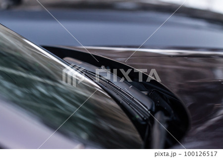 Car windwhield wiper close up. Modern car windshield wiper. 100126517