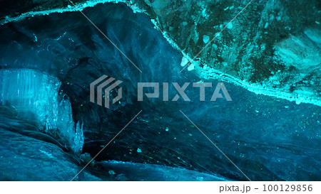 Turquoise pure color of ice inside the ice cave. Turquoise pure color of ice inside the ice cave. 100129856