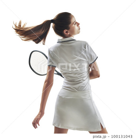 Never underestimate the competition. Studio shot of a female tennis player holding a racket against a white background. 100131043